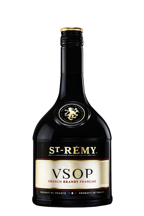 A bottle of St-Rémy VSOP French Brandy Français, featuring a dark glass bottle with a gold foil seal and a cream and gold label.
